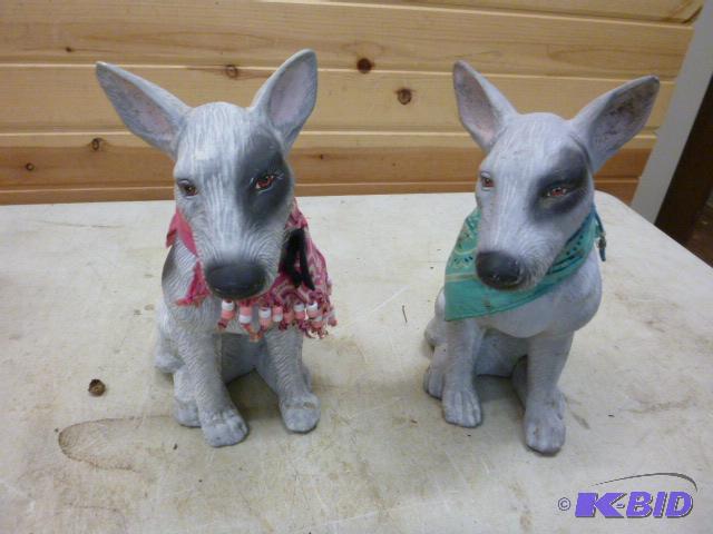lot 44 image: Two Garden Dogs One has a chip on the ear....