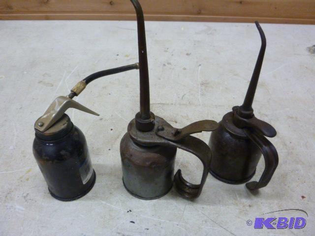 lot 84 image: Three Oil Cans...