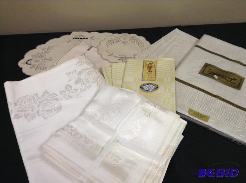 lot 10 image: Vintage lot of linens including table clothes and napkins
