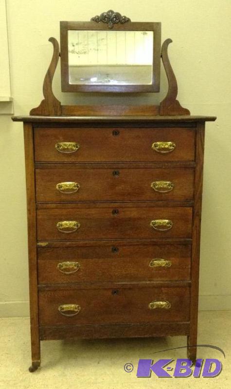 lot 101 image: Antique F. H. Peterson & Co. Wood Dresser with Swing Mirror