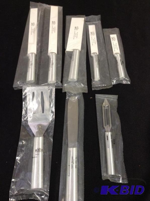 lot 114 image: Lot of new RADA Cutlery bread slicers, cooks, utility and paring, spatula, spreaderveggie peeler