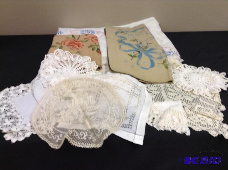 lot 116 image: Lot of vintage linens hand embroidered covers, dollies and Forget Me Not sham