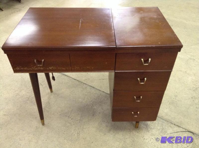 lot 128 image: Vintage Kenmore Sewing Machine