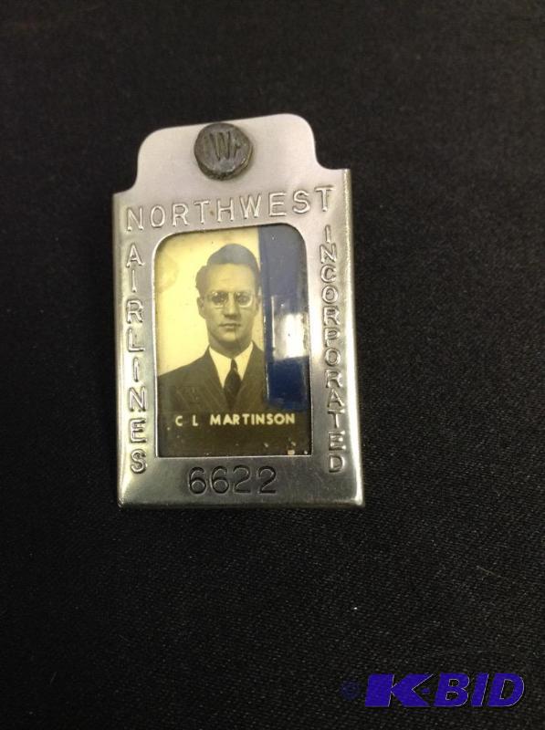lot 15 image: Vintage Northwest Airlines employee metal badge #6622