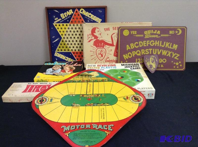 lot 23 image: Lot of vintage games. Ouija, tin Motor Racechecker board, and more