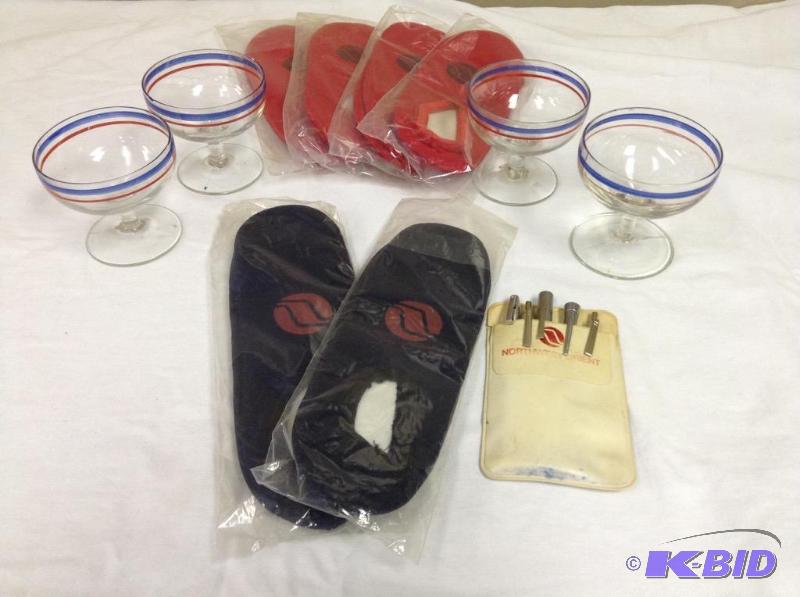 lot 35 image: Lot of vintage Northwest Airlines items-slippers,pocket protector, glassware