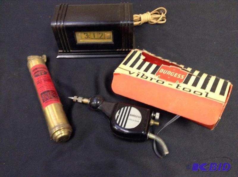 lot 74 image: Vintage Pennwood Numechron electric clock,  Burgess electric engraver and Merlite fire extinguisher