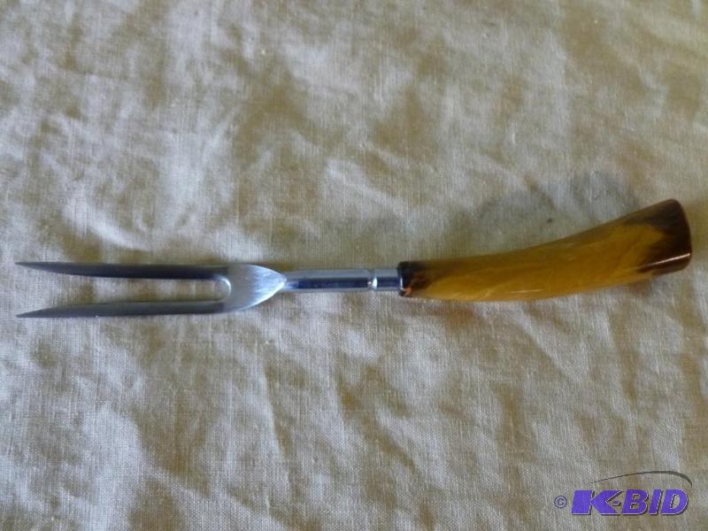 lot 41 image: Vintage Bakelite handled meat fork that measu...