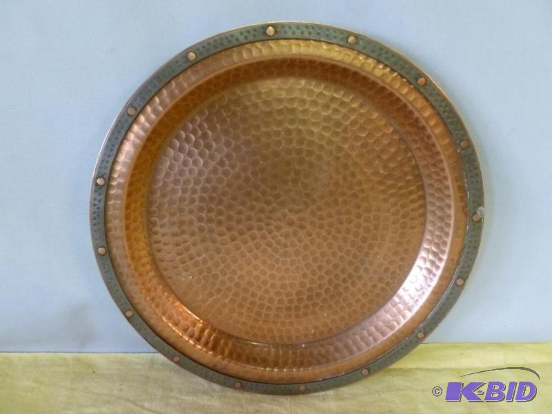 lot 43 image: Large vintage hammered copper plate that meas...