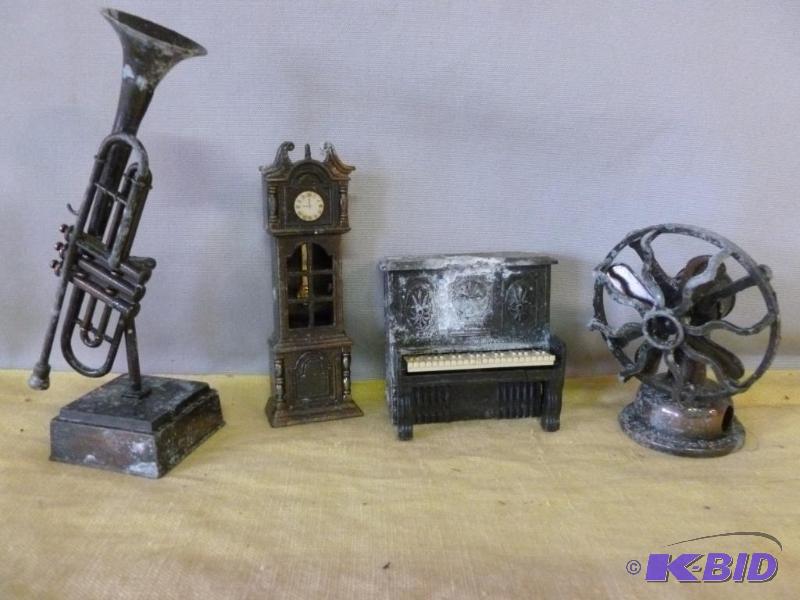 lot 45 image: Lot of four collectible die cast metal pencil...