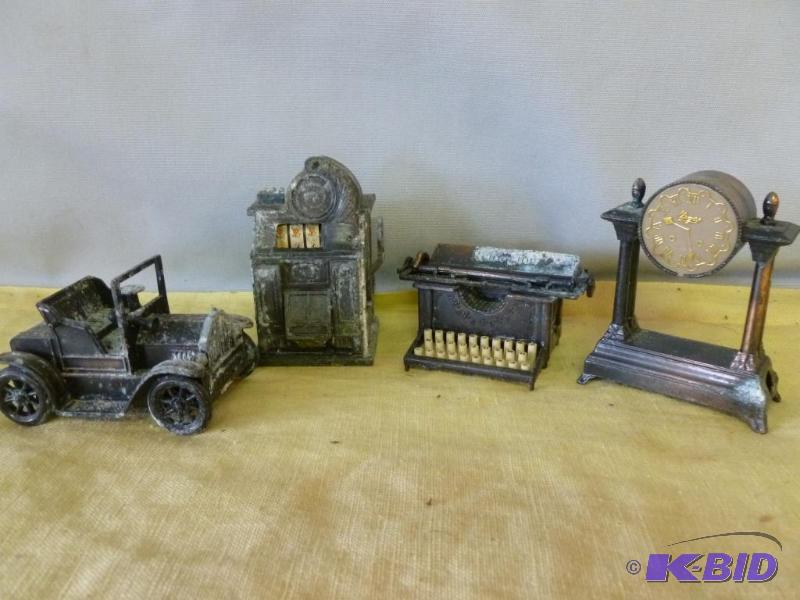 lot 46 image: Lot of four collectible die cast metal pencil...