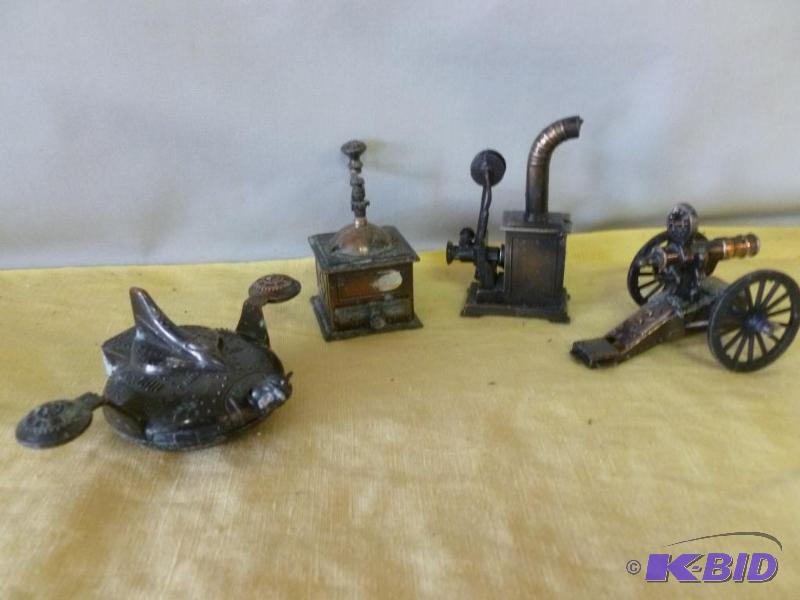 lot 47 image: Lot of four collectible die cast metal pencil...