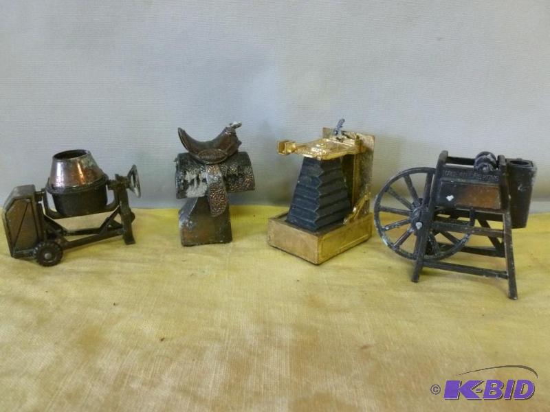 lot 49 image: Lot of four collectible die cast metal pencil...