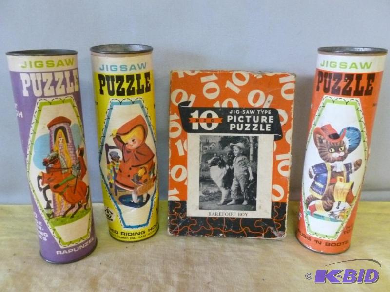 lot 65 image: Lot of vintage puzzles that includes three HG...