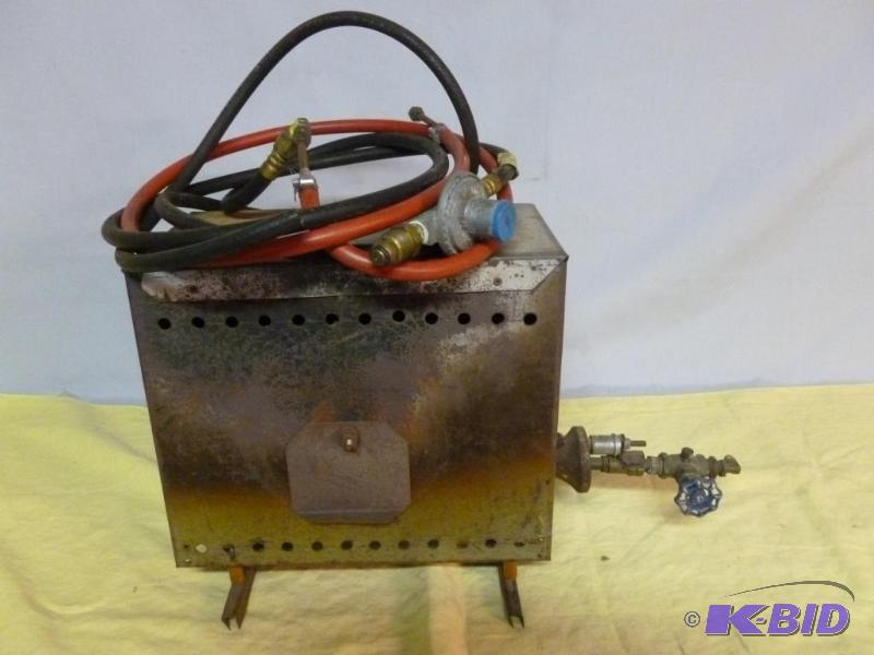 lot 7 image: Propane gas fish house stove, comes with a re...