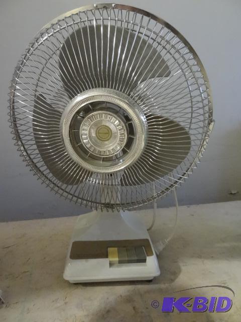 lot 62 image: 12" Oscillating Fan Works...