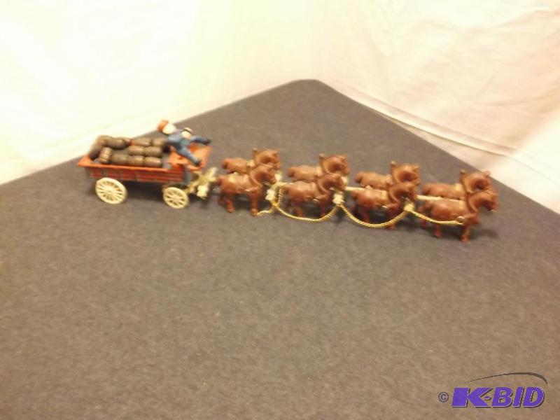 Collectable cast iron toy beer wagon with bar...