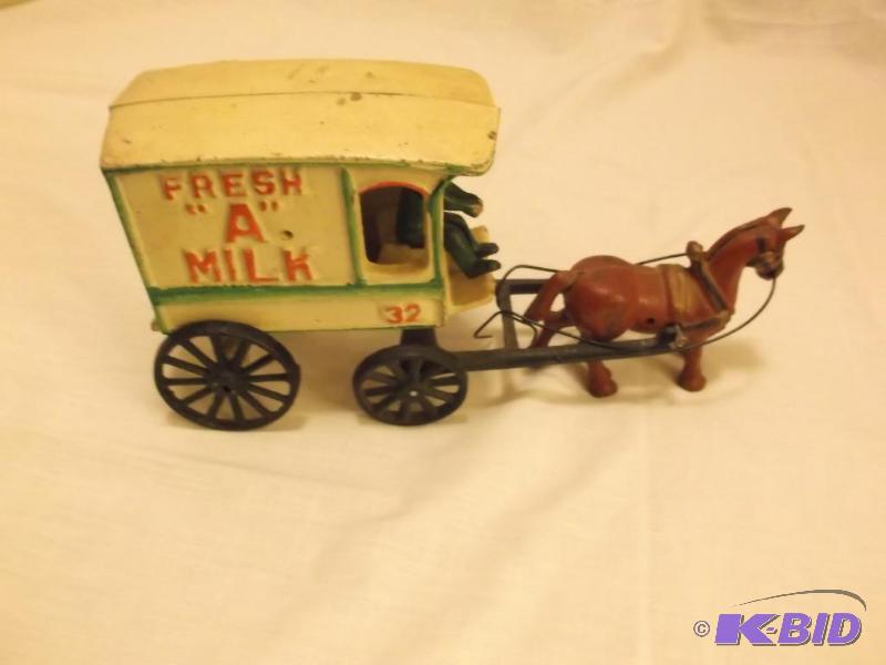 Collectable cast iron toy milk wagon 11&quot...