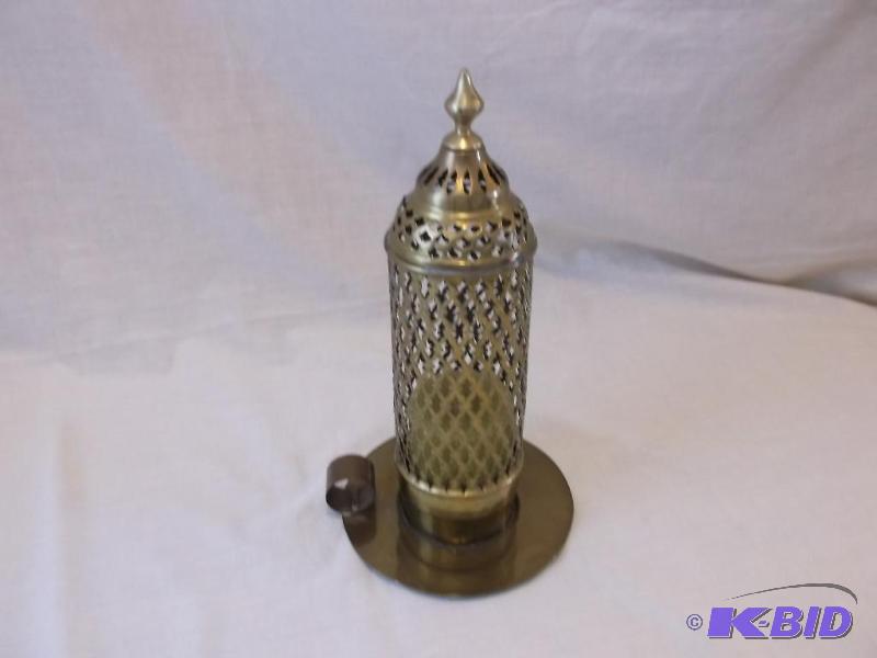 Collectable brass finger candle holder....