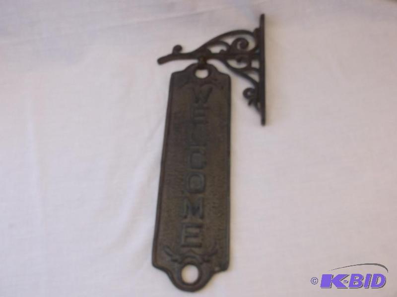 Large cast iron welcome sign with mounting br...