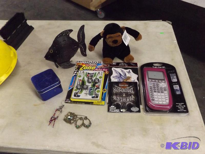 lot 257 image: Misc. lot of toys, jewelry, stickers, calculator