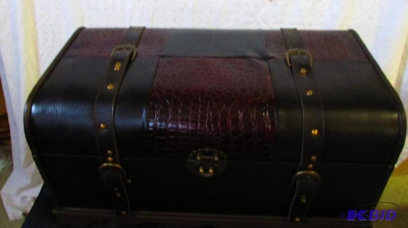 wooden framed chest with leather look to it o...