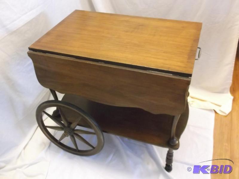lot 51 image: Beautiful solid wood beverageserving drop le...