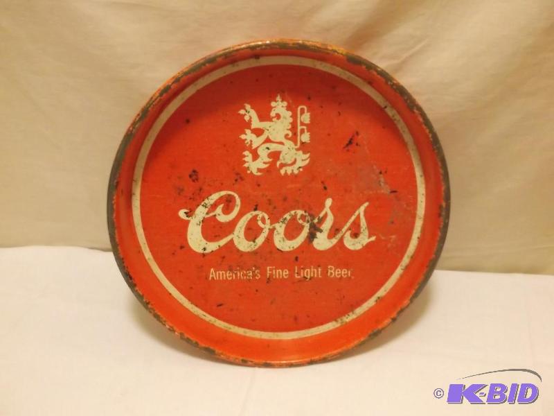 lot 55 image: Vintage Coors serving tray showing some age b...