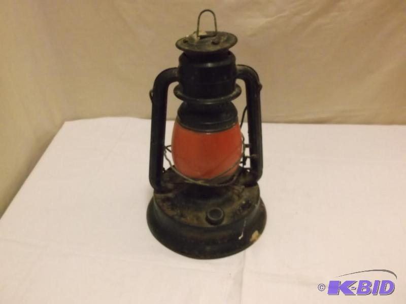 lot 56 image: Vintage Dietz red glass lantern very rusty st...