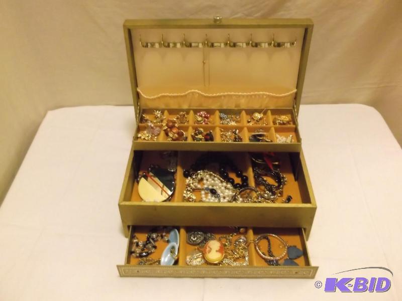 lot 64 image: Jewelry box load with jewelry bracelets,neckl...