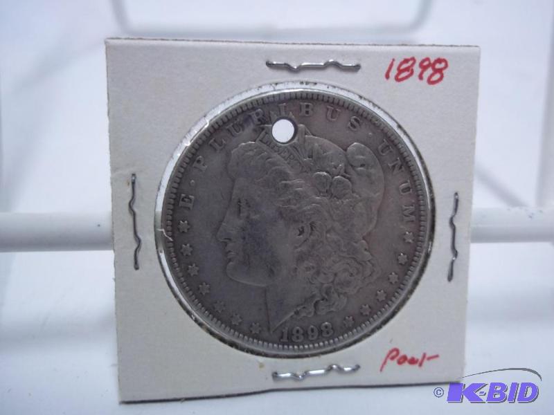 1898 Silver Dollar Has hole drilled through t...