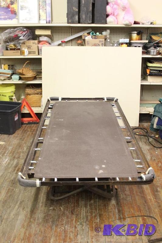 lot 349 image: Twin Size Hide Away Cot, Flattens for easy st...