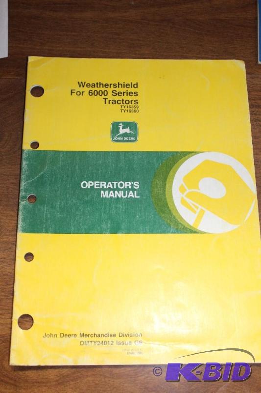lot 473 image: John Deere Weathersheild&nbsp6000 Series Tra...