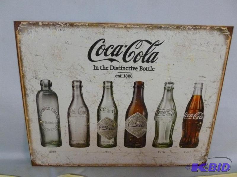 lot 59 image: Collectible Coca-Cola In The Distinctive Bott...