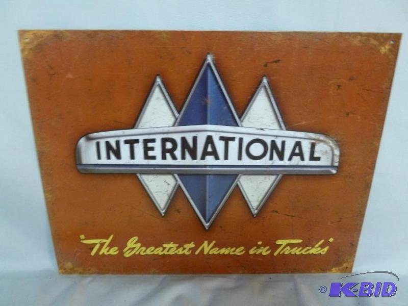 lot 79 image: Collectible International Metal Sign That Mea...