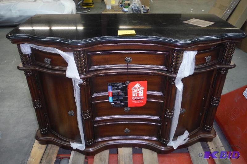 lot 40 image: Coaster Beautiful Black Marble Top Entry Way Accent Bombe Chest,Has a few blemishes at bottom from shipping straps oterwise looks brand new