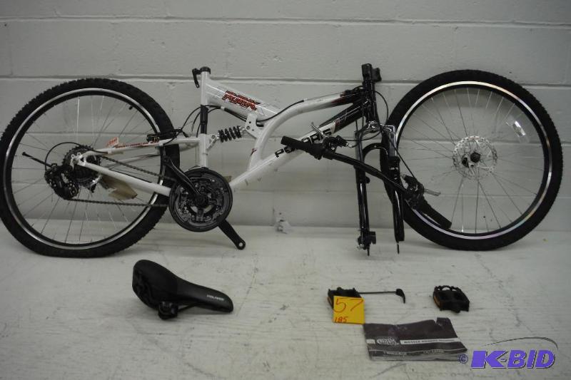 lot 56 image: Polaris RMK Mountian Bike (WhiteBlack, 26 X 19-Inch),Maybe riden once, has some shipping damage, Missing nut for quick change on front tire