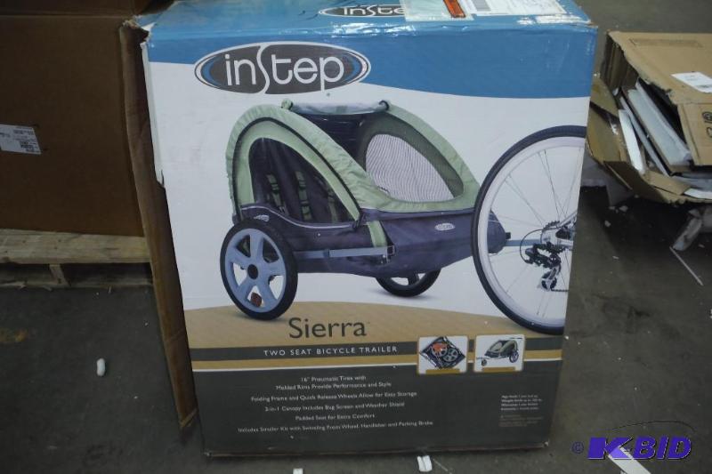 lot 84 image: Instep Sierra Double Bicycle Trailer W Folding Frame & Quick Release Wheels Allow For Easy Storage- Brand New in Box