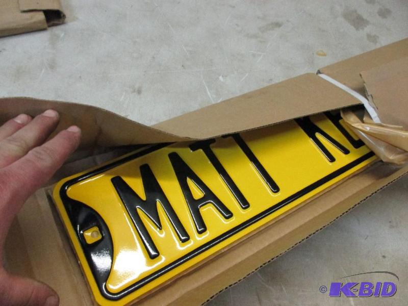 stack of Matt Kenseth street signs...