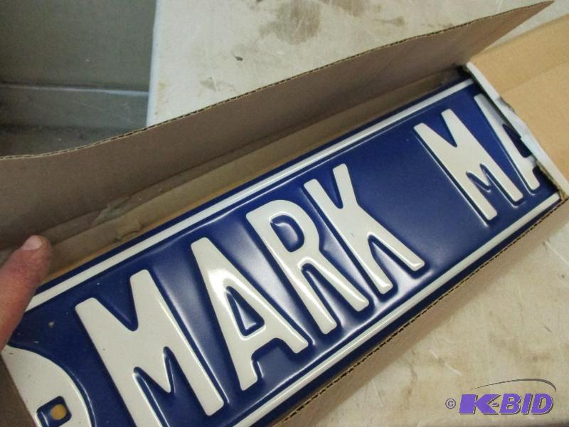 Stack of Mark Martin street signs...