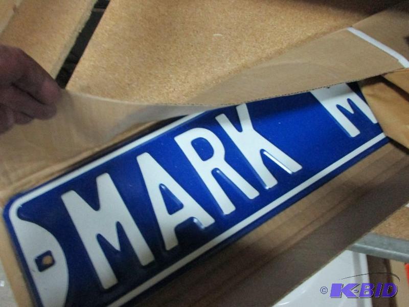 Stack of Mark Martin street signs...