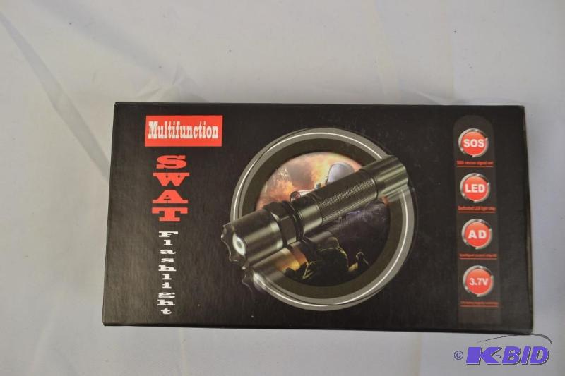 lot 6 image: Multifunction SWAT Flashlight