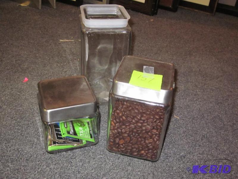 Lot of (3) glass cannisters, (1) missing the ...