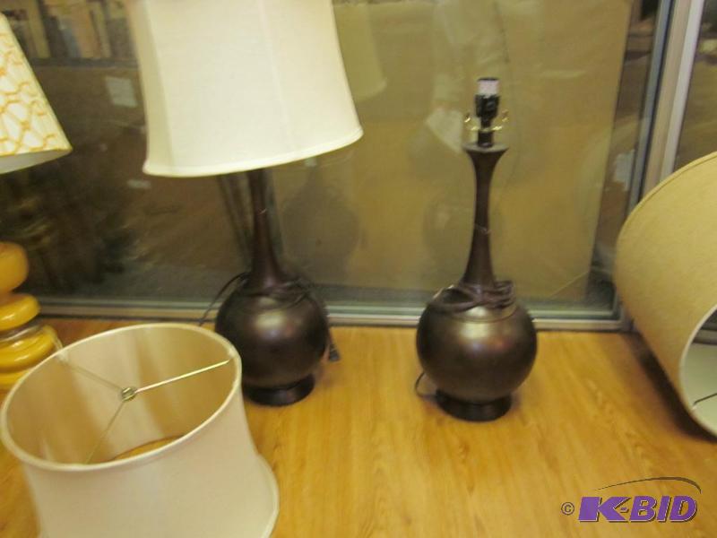 Pair of metal decorative lamps, both have dam...