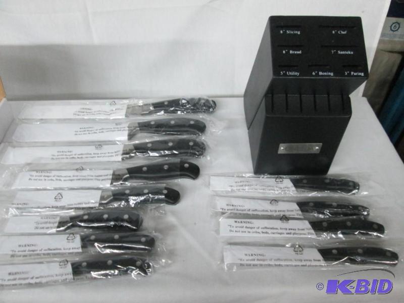 lot 27 image: Oneida 14-Pc. Triple Rivet Cutlery Set