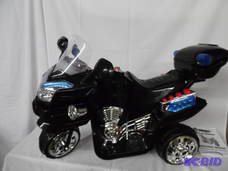 lot 39 image: Lil Rider FX 6V 3-Wheeled Ride-On - Black