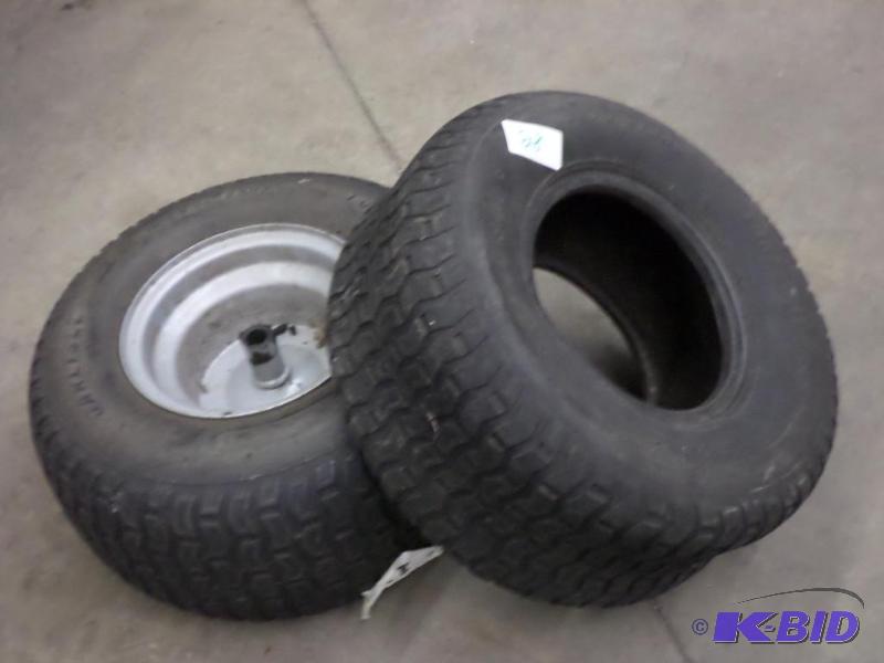 lot 28 image: (2) 18x8.50x8 Lawn Tractor Tires, (1) With Wh...