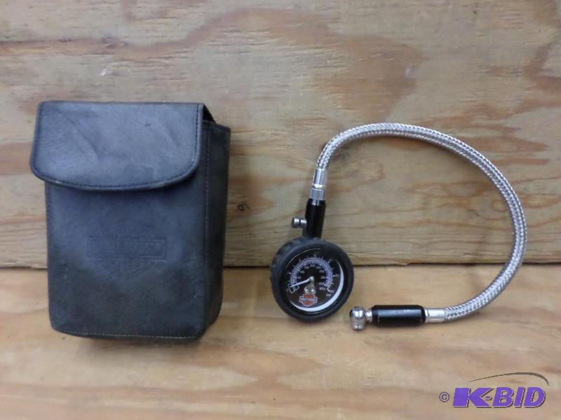 lot 37 image: Harley Davidson 60# Tire Gauge With Case...