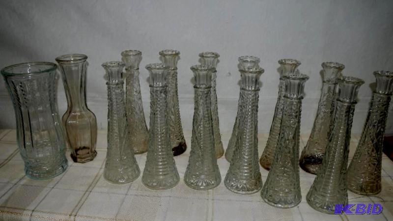 15 used glass vases, 13 are the same and 2 ar...