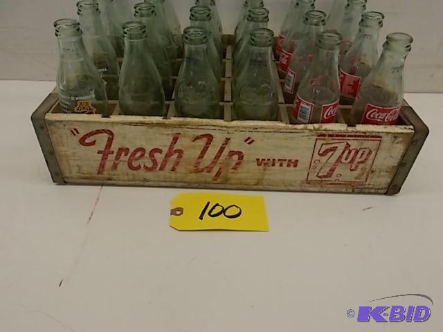 lot 100 image: (24) Assorted Coca-Cola Bottles with 7 Up Woo...